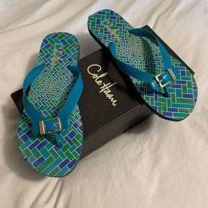 Rubber teal flip flops